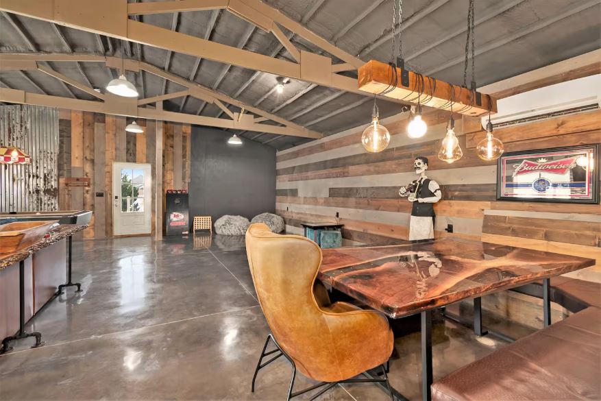 Dining area with wooden table and chairs for group meals