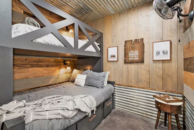 Comfortable bedroom with rustic wooden bed frame