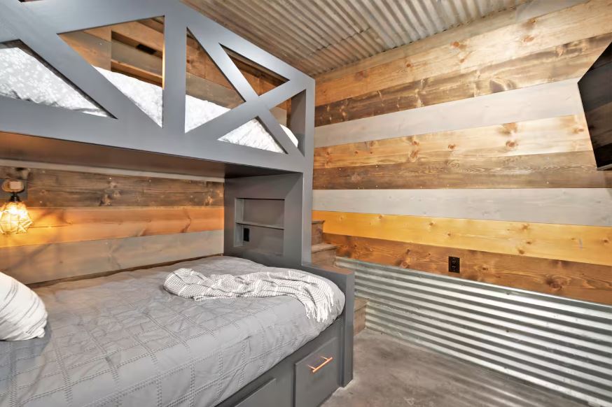 Well-lit bedroom with comfortable bedding