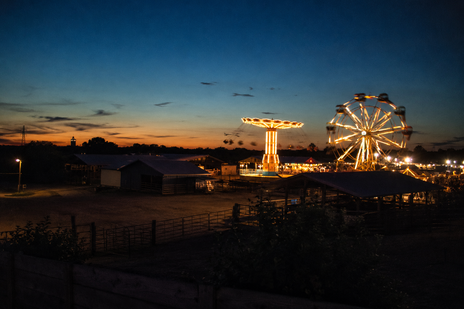 Platte County Fair carnival at dusk, one of the most family friendly events in the Northland KC each July