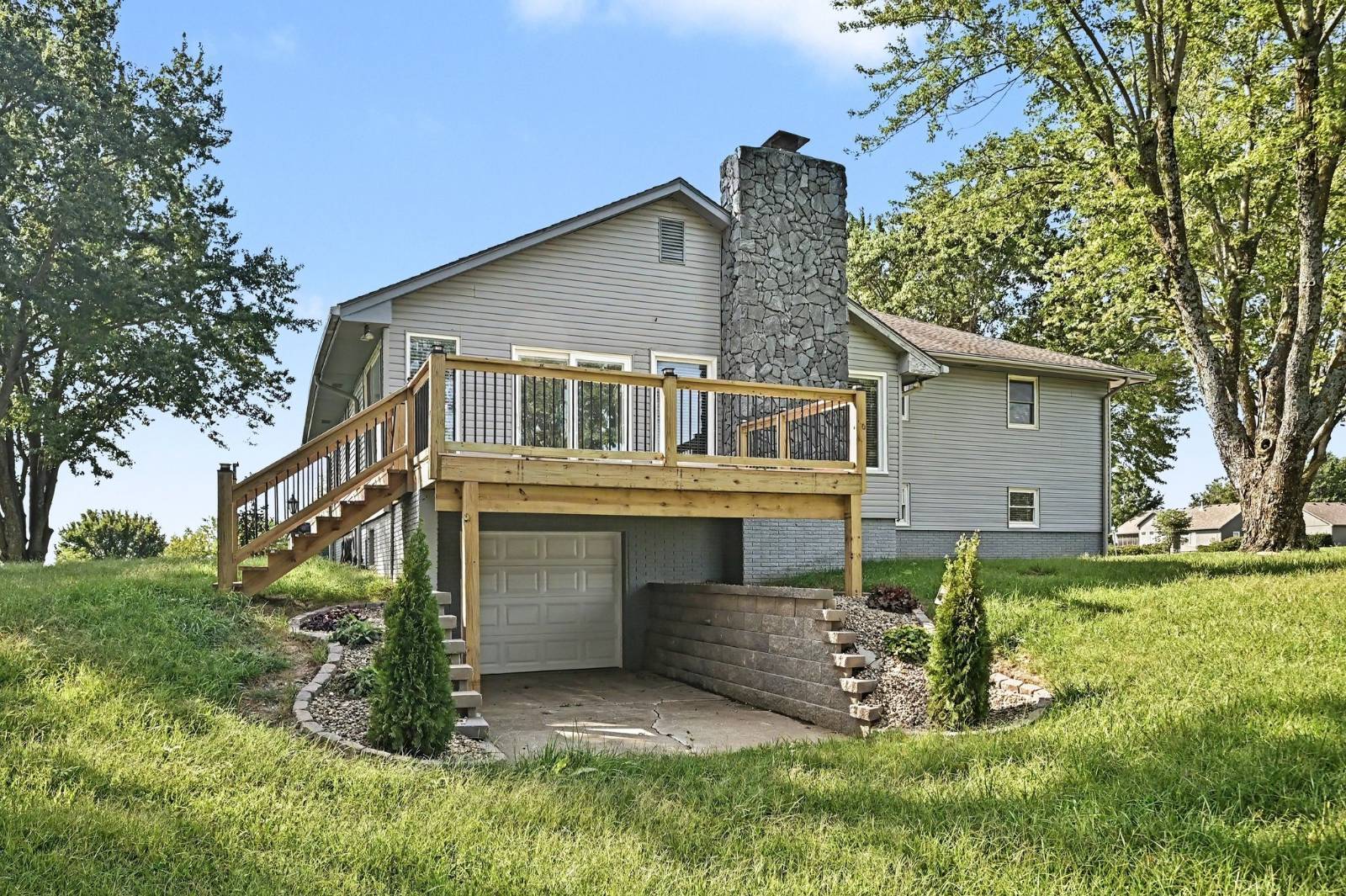 Rear deck and lower utility garage
