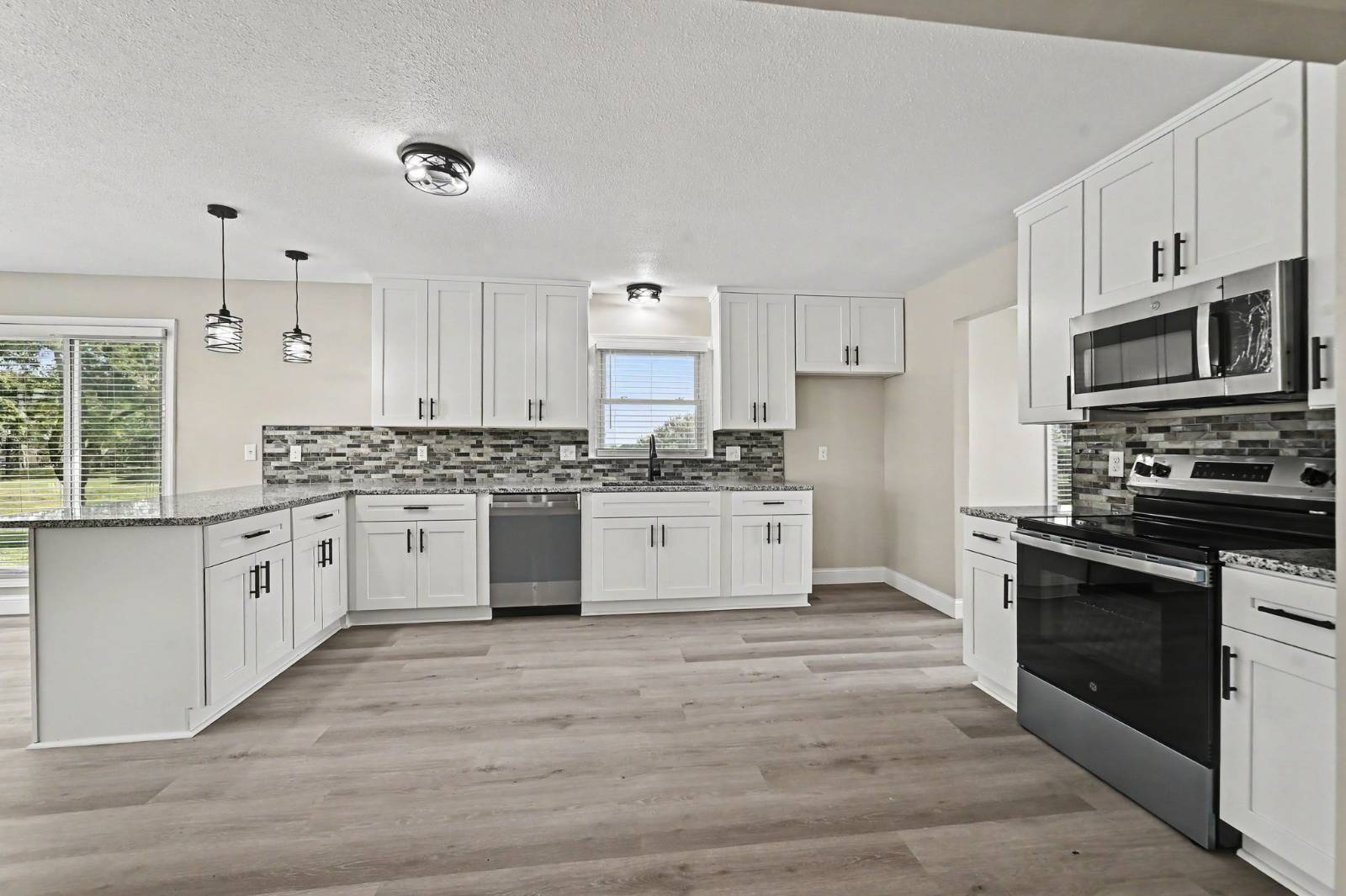 Renovated white kitchen with modern finishes