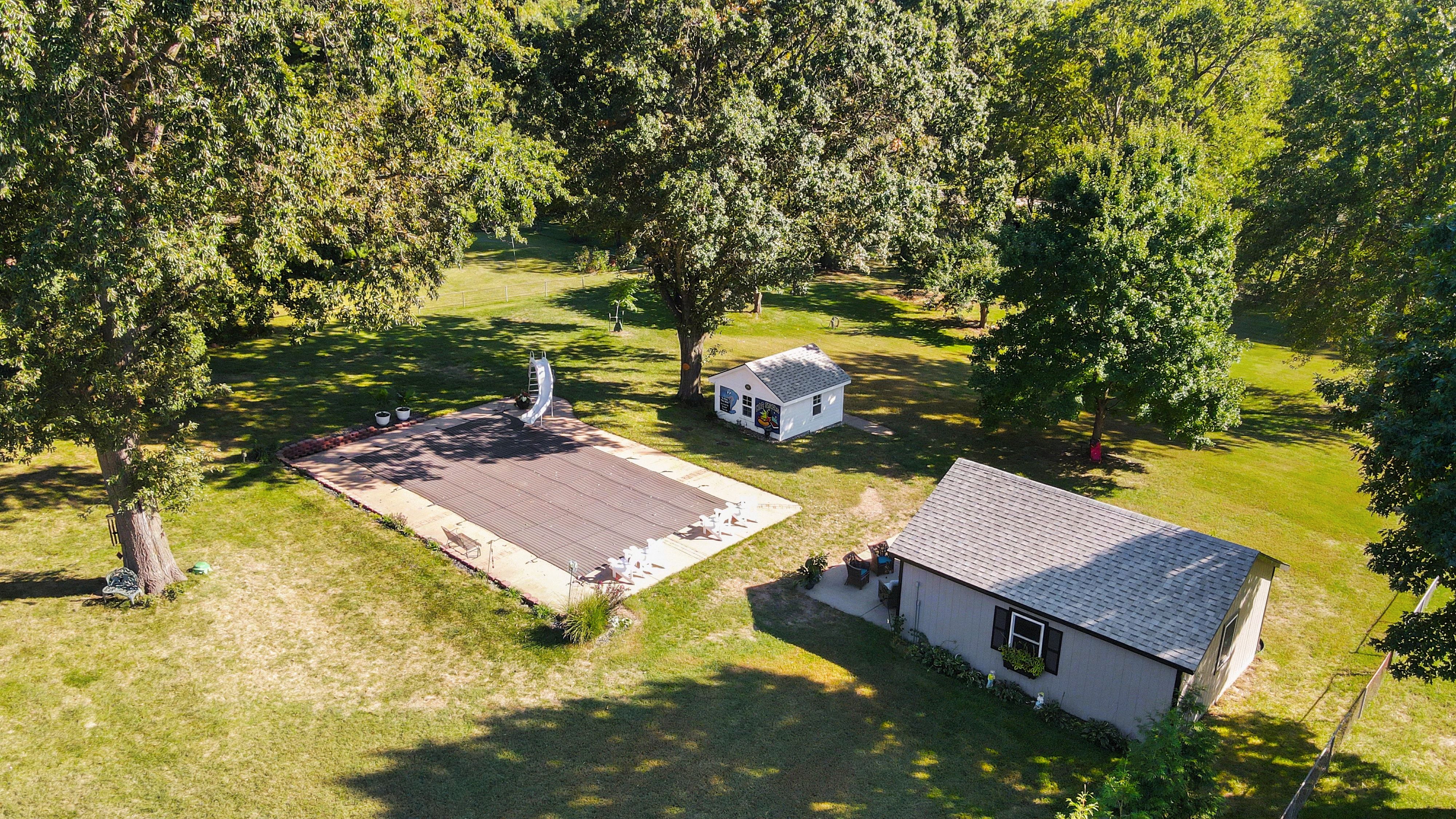 Aerial of salt water pool and pool house