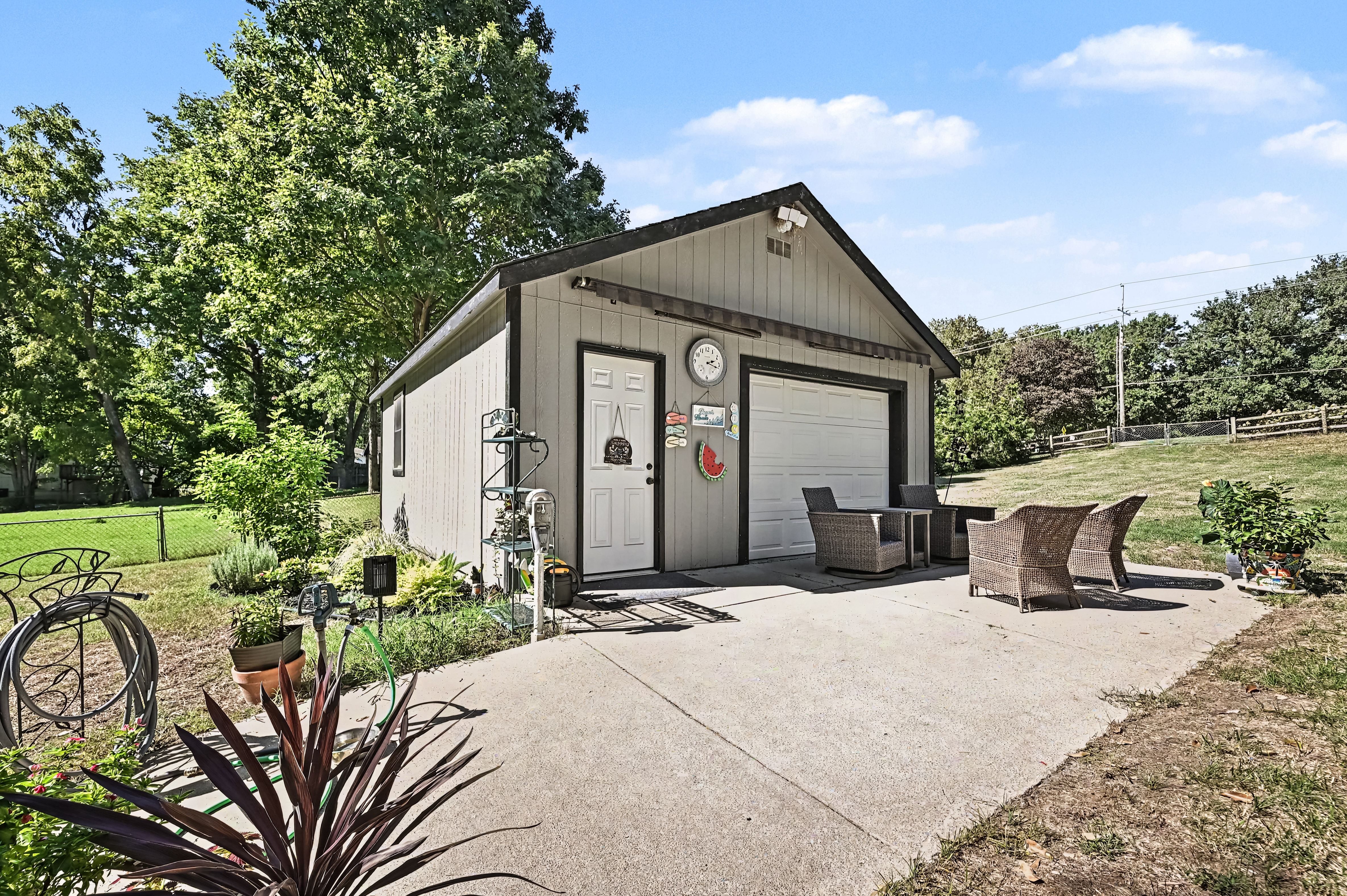 Detached garage workshop with Sunsetter awning