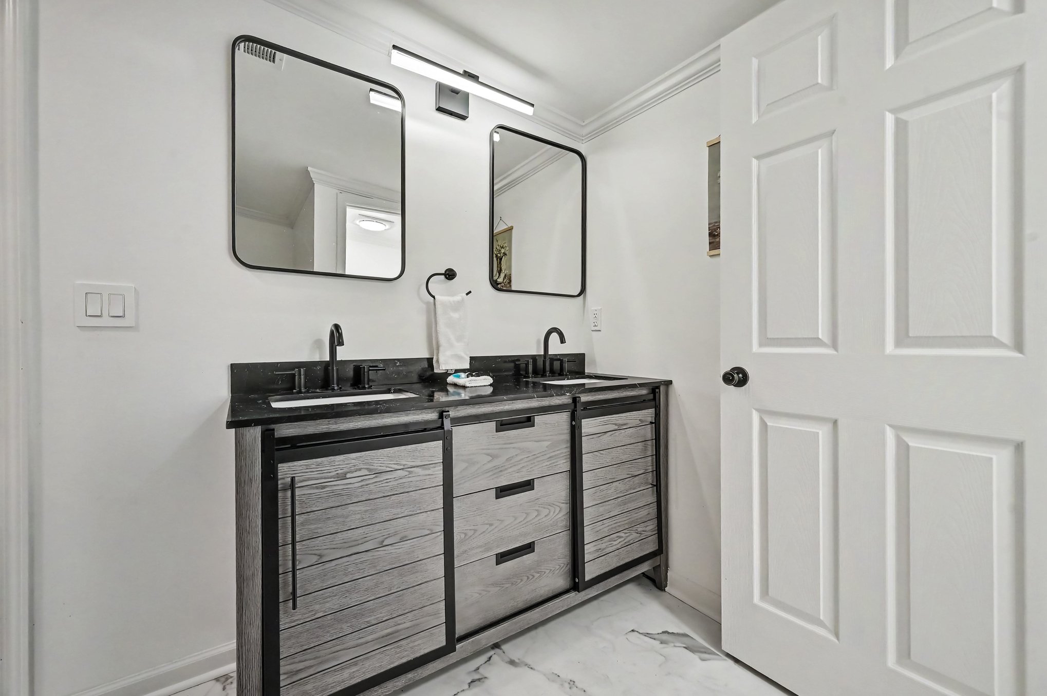Second double vanity with sliding barn-style doors