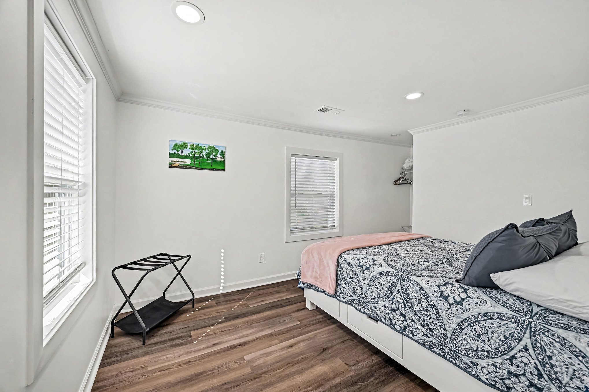 Bedroom with storage bed and luggage rack