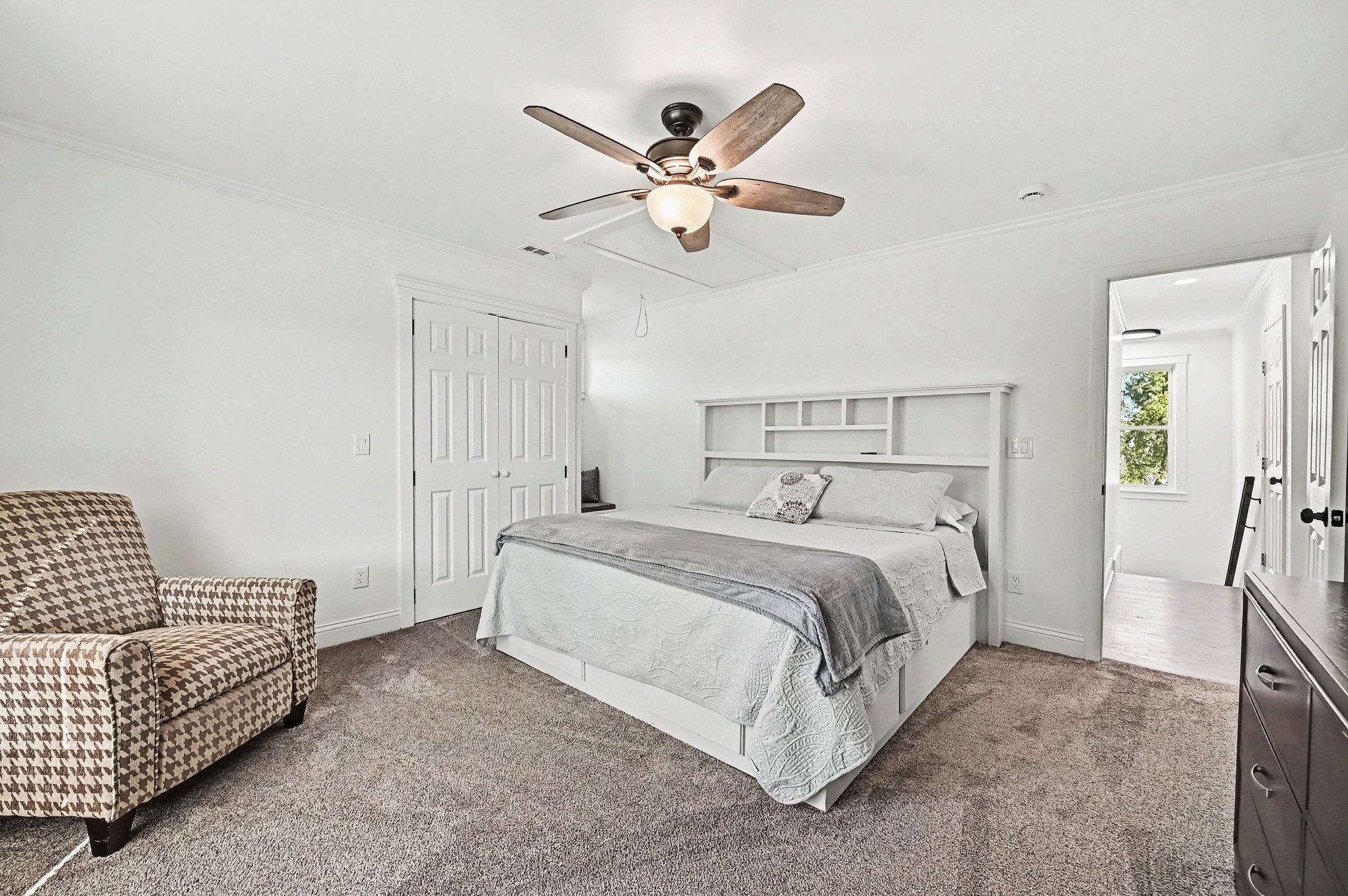 Upstairs king bedroom with double closet and carpet
