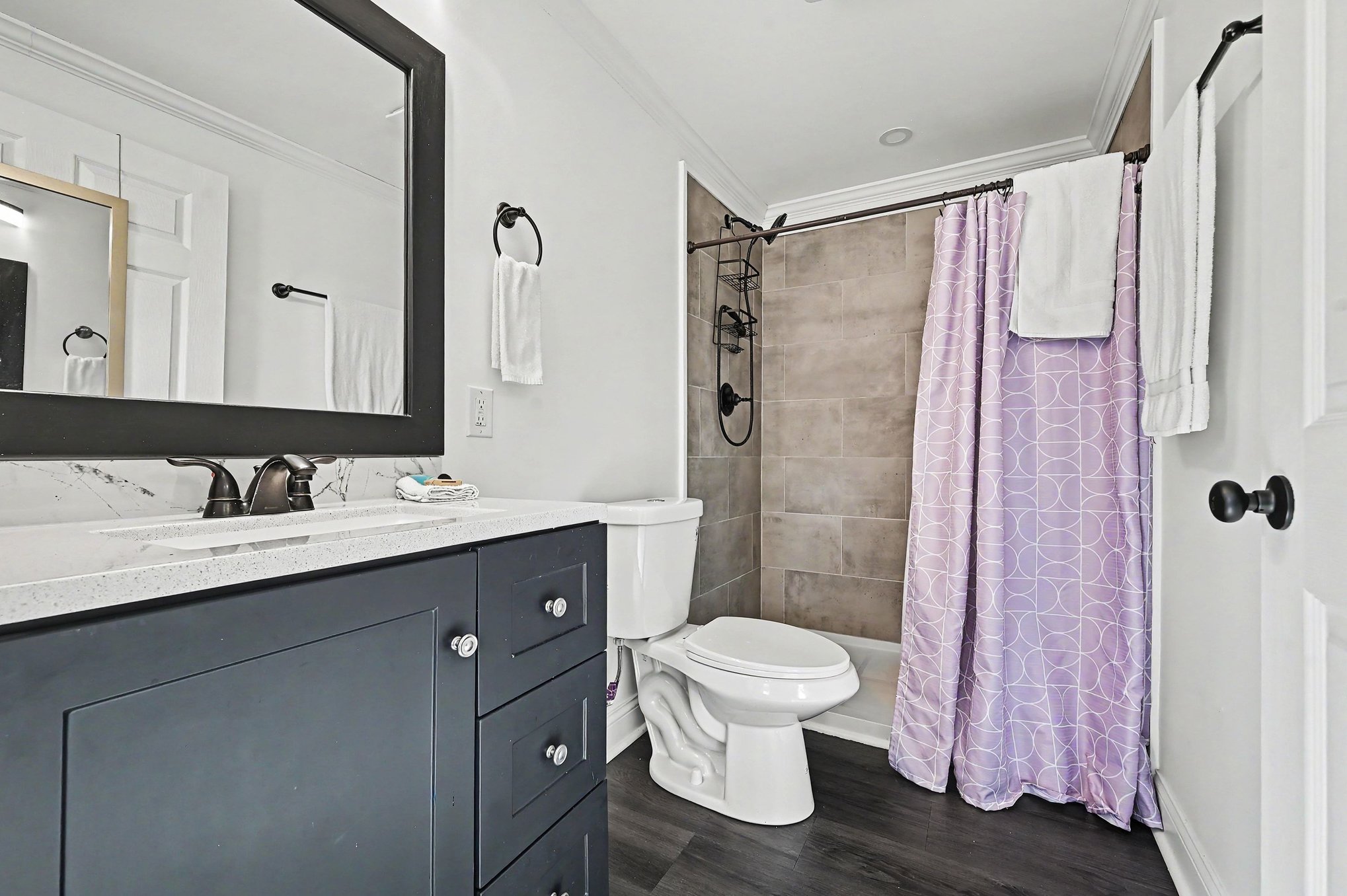Guest house bathroom with tiled shower