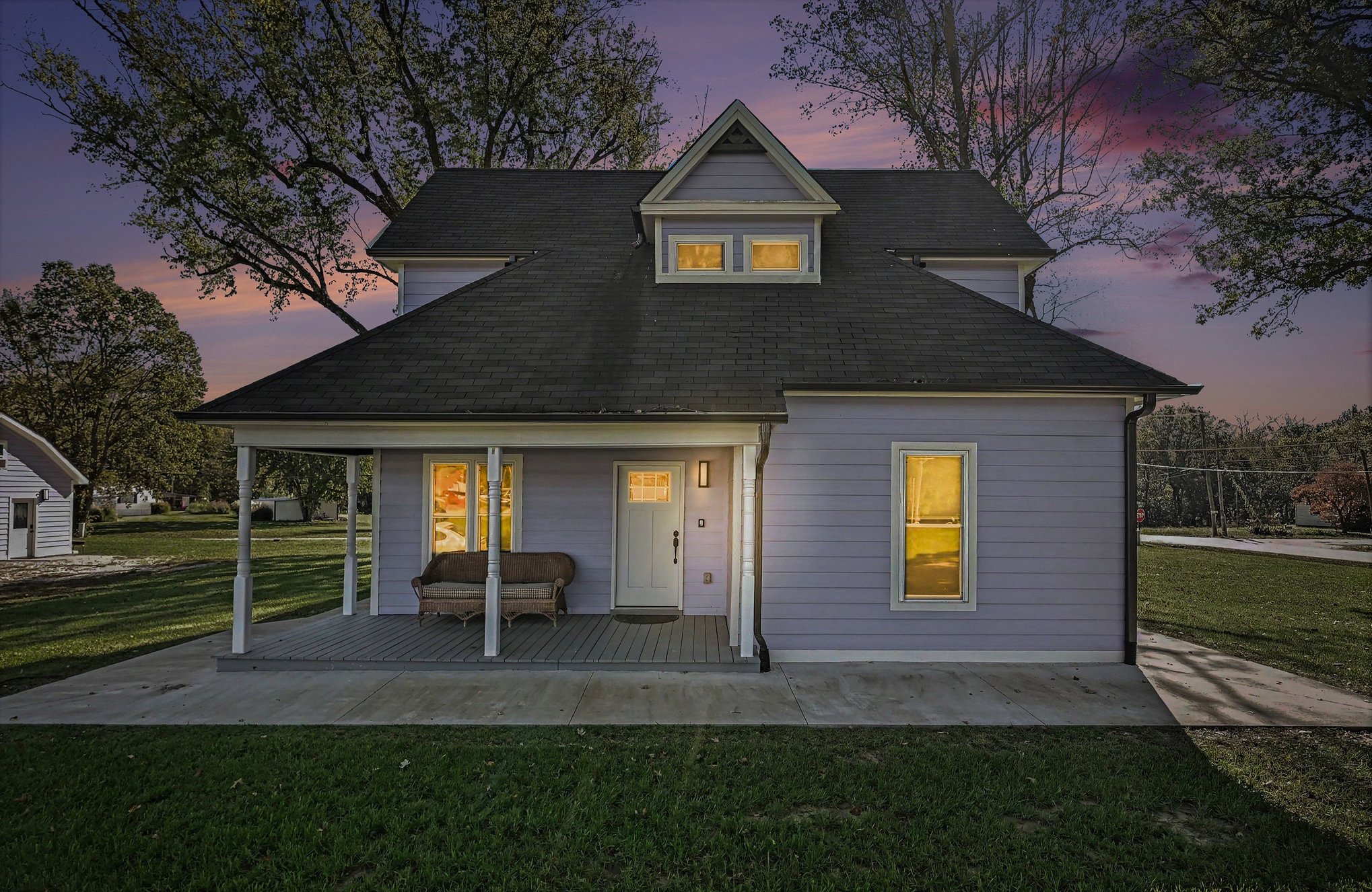 495 Main Street Holt MO renovated farmhouse with detached guest house for sale on a shaded corner lot