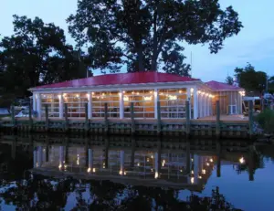 alt="The waterfront dining area at The Point Crab House & Grill, a popular local seafood restaurant in Arnold, MD."