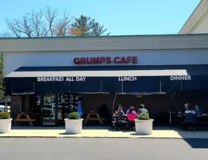 alt="The fun, retro-themed interior of Grumps Cafe, a popular local restaurant in Crofton, MD."