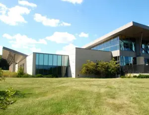 alt="The indoor water park and slide at the North Arundel Aquatic Center in Glen Burnie, a top family attraction."