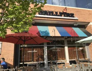 alt="The upscale interior of George Martin's Grillfire restaurant in The Hotel at Arundel Preserve, Hanover, MD."