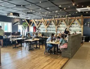 alt="The waterfront dining area at The Rumor Reel, a popular local restaurant in Pasadena, MD."