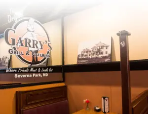 alt="The comfortable and welcoming dining area at Garry's Grill, a local favorite restaurant in Severna Park, MD."