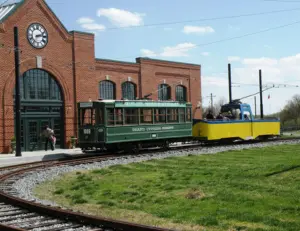 alt="A vintage streetcar on display at the National Capital Trolley Museum, a family-friendly attraction near Silver Spring, MD."