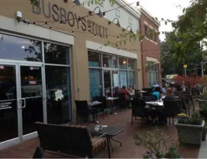 alt="The vibrant interior of Busboys and Poets in Hyattsville, MD, a popular restaurant and community gathering space."