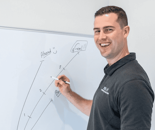 Scott Keevers mapping a growth plan on a whiteboard