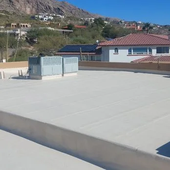 Reflective coating finished across a large flat roof