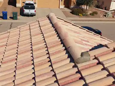 Close on a tile ridge and its flashing detail