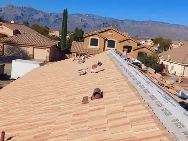 New tile going down around a roof penetration