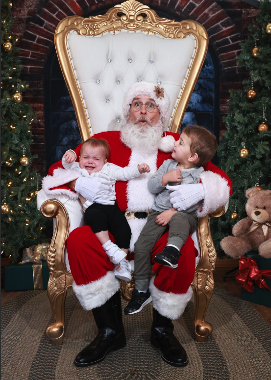 A family creating Christmas memories with Santa.