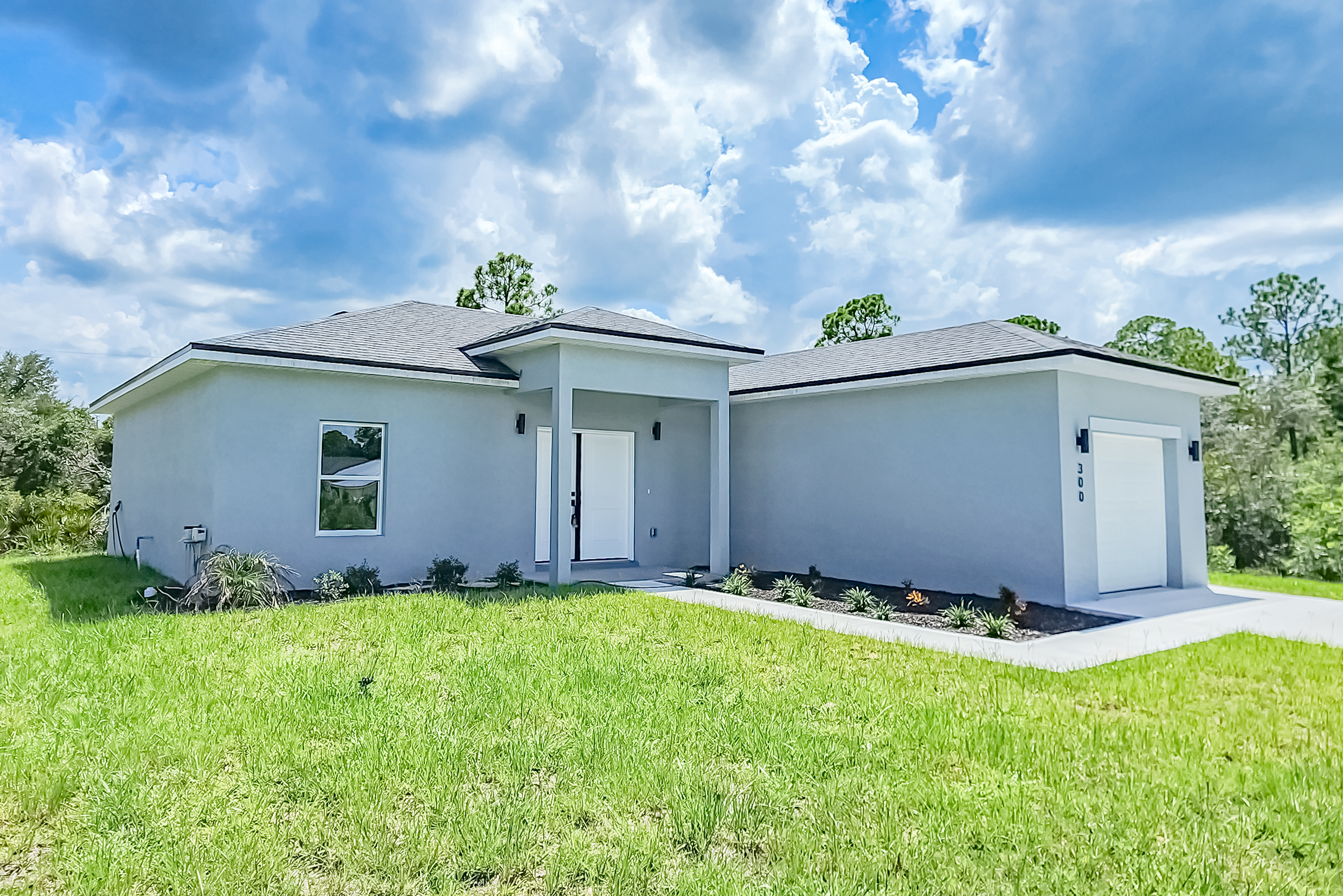 Caspian home exterior featuring a modern single-story design
