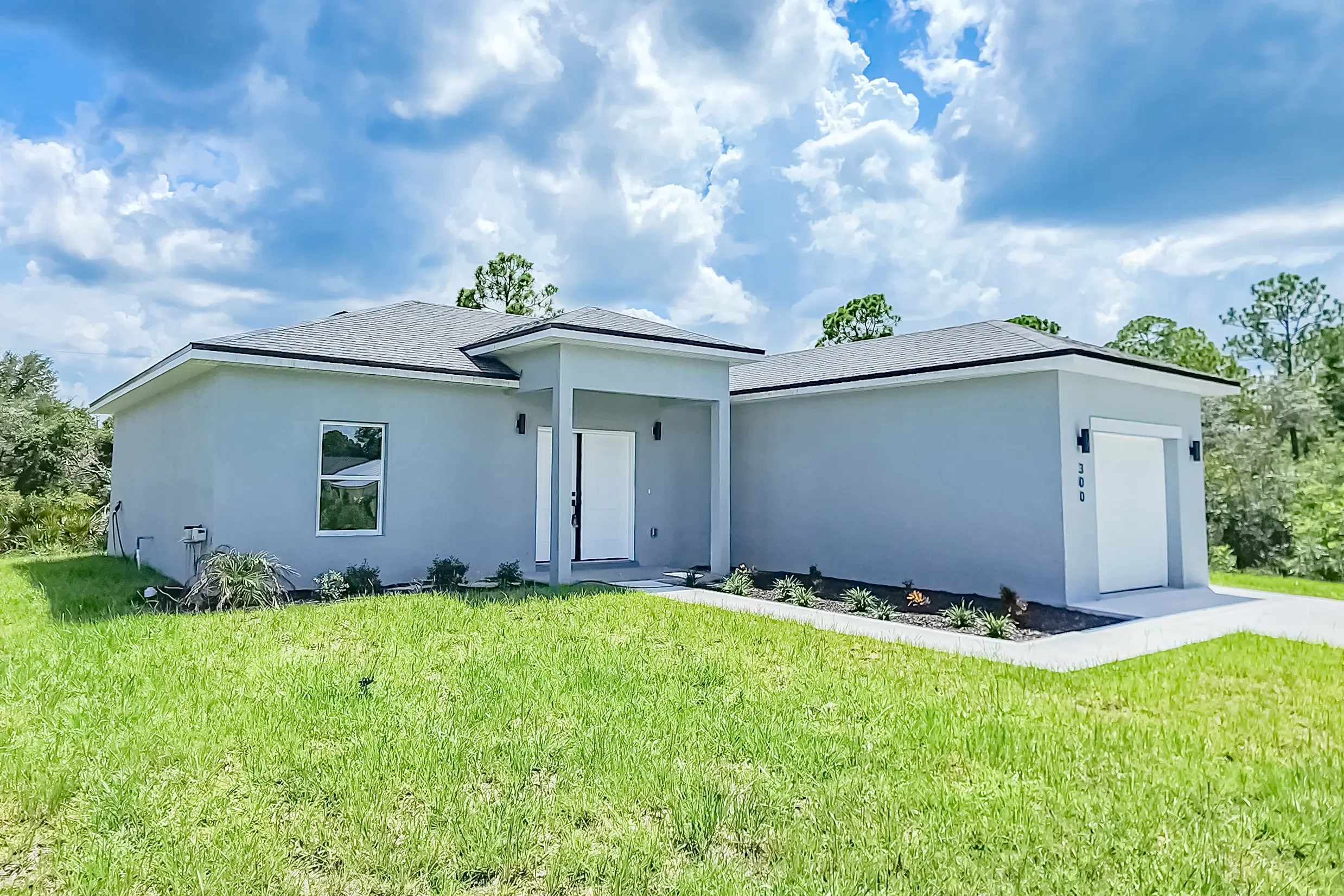 Caspian home exterior featuring a modern single-story design