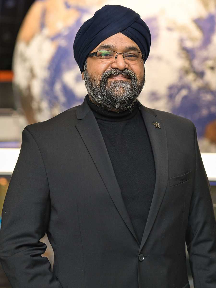 Sukhi Wahiwala Speaking on Stage