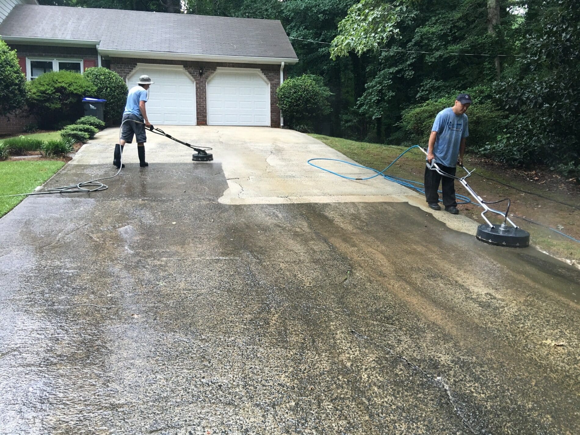 Concrete driveway in Port St. Lucie after surface cleaning, bright and even