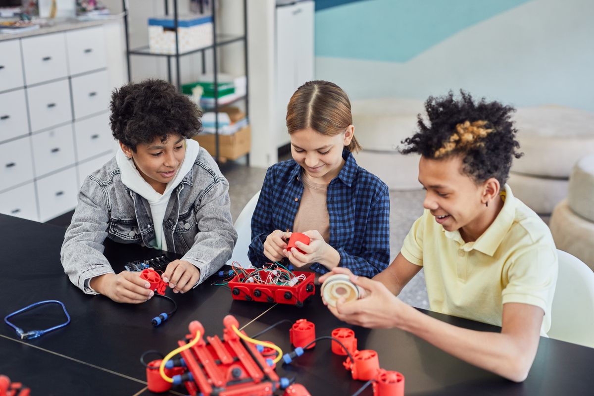 Kids working together on robots