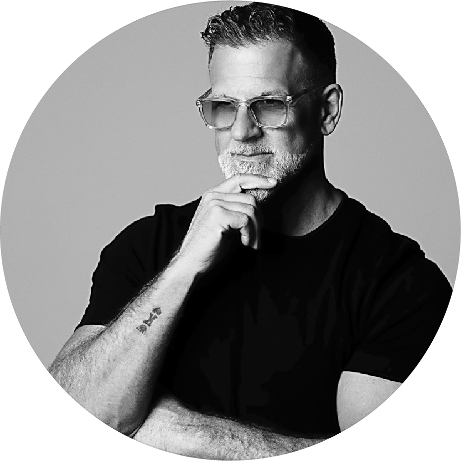 Black and white photo of Steven Eugene Kuhn in a simple black t-shirt.