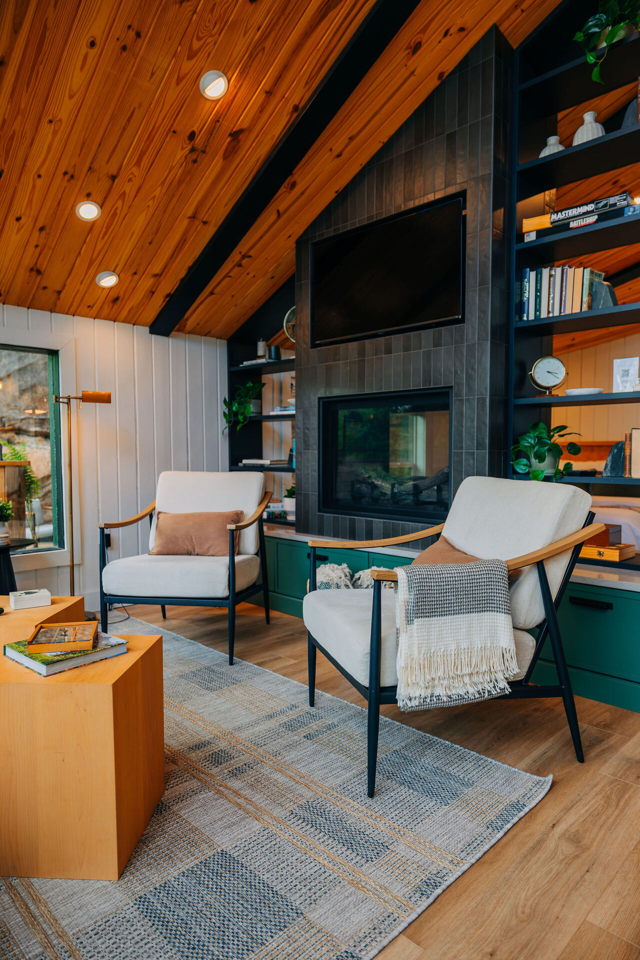 Living room at Rockface Retreat with wall-to-wall windows