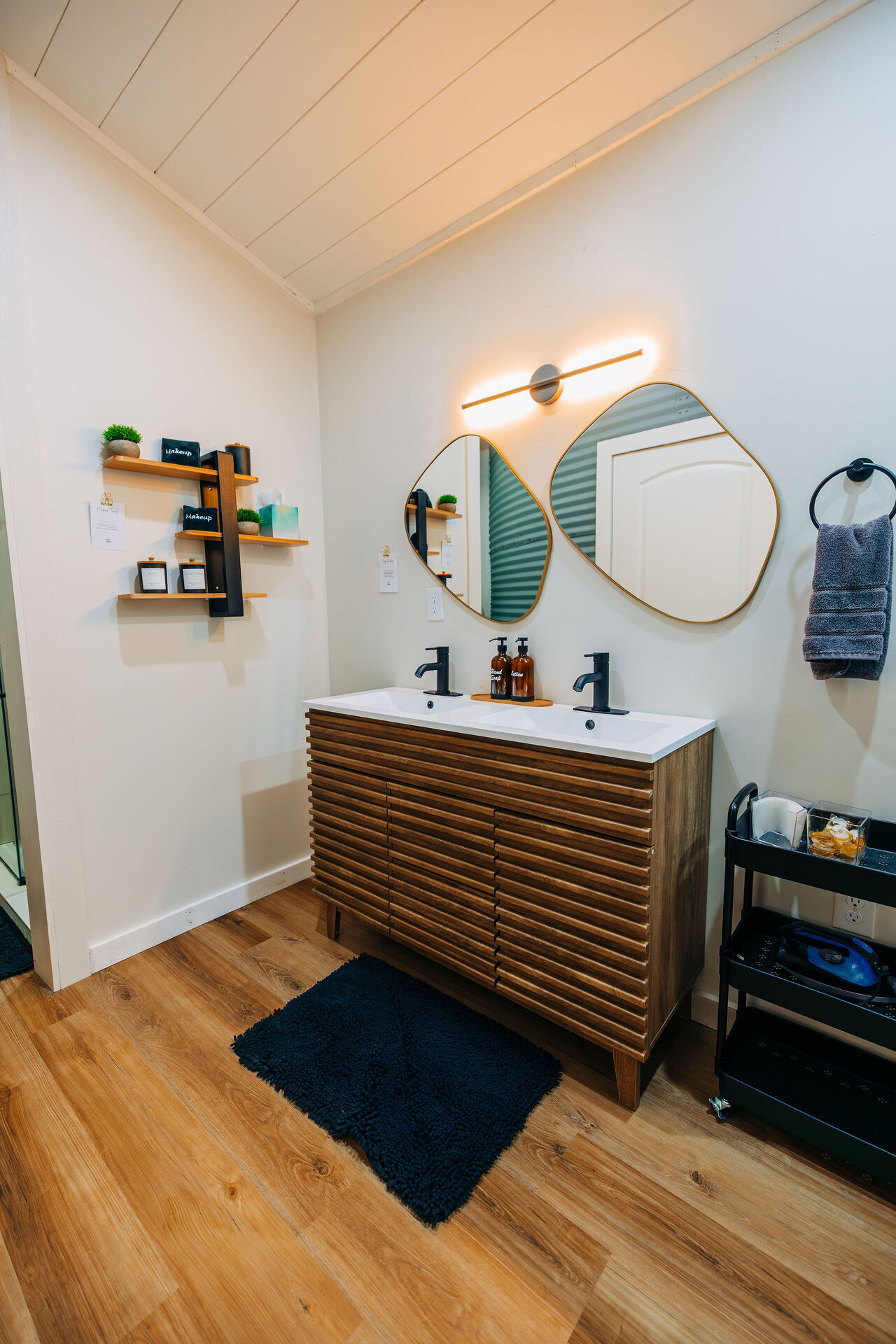 Bathroom vanity and mirror at The Yoder