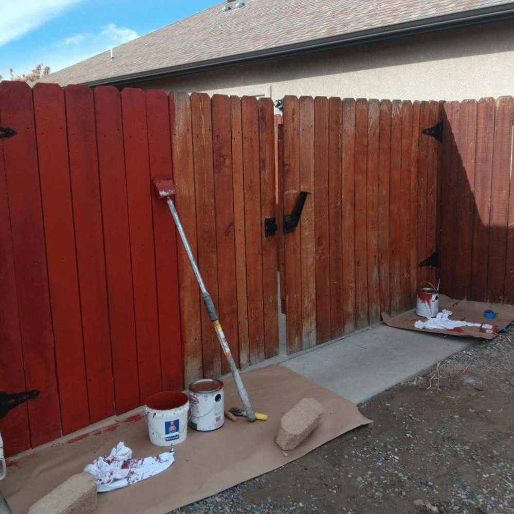 painting a fence