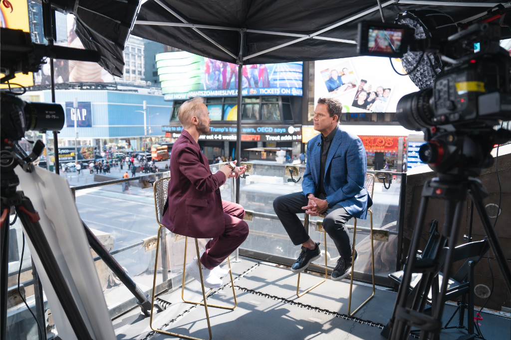 Dr. Stacey Frick speaking with Chris Voss on Broadway
