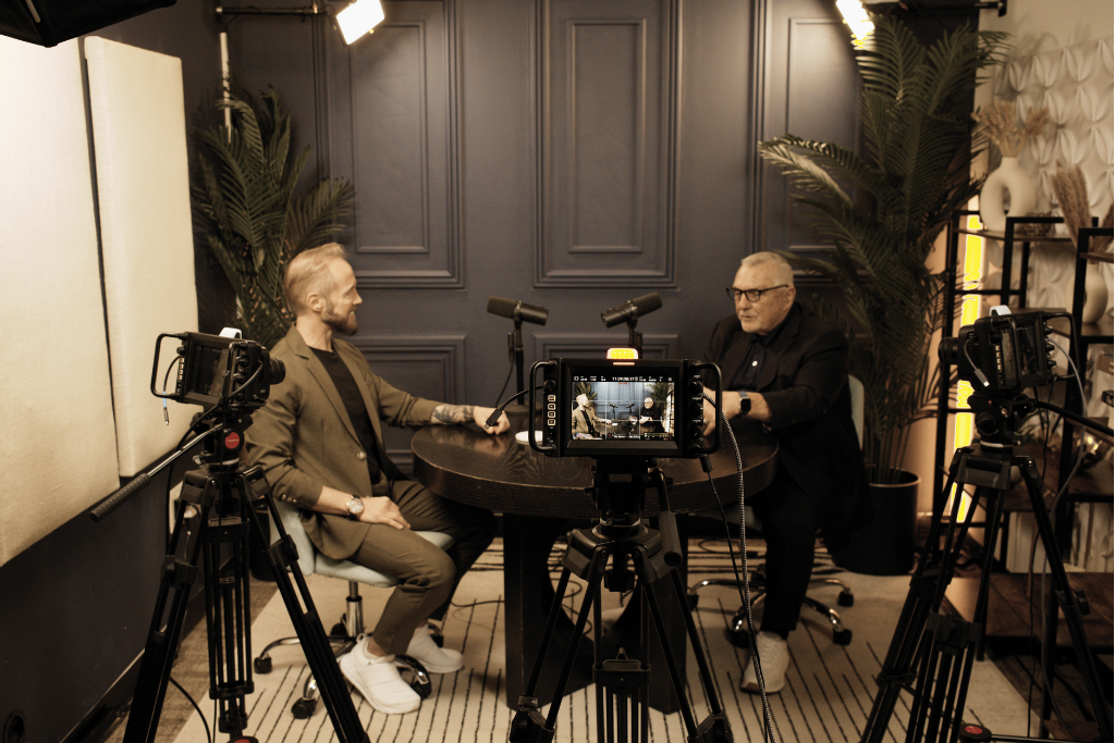Dr. Stacey Kevin Frick on set With "Rudy" Ruettinger - Driven By Purpose