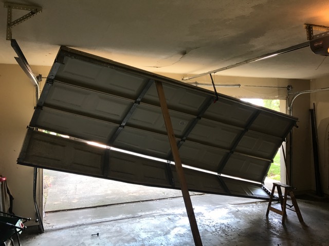 Garage door off track repair