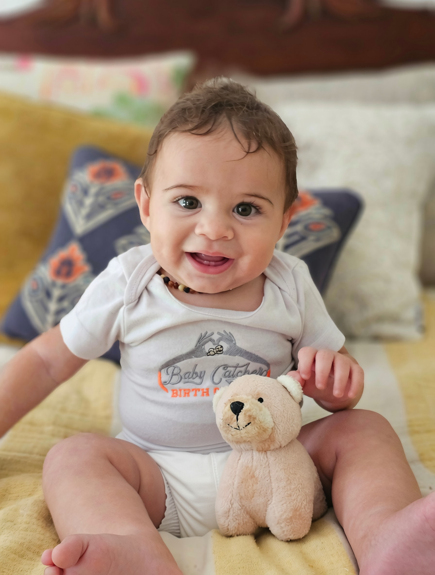 Baby in a Baby Catcher onesie