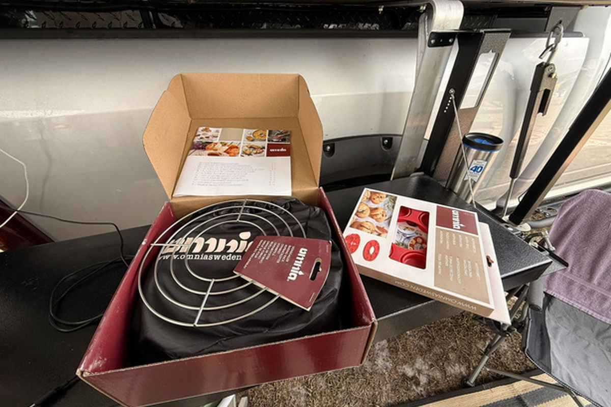 Jenn Crooks giving a video tour of the new BundutecUSA RipTide fully customizable shell camper model to Cory Web from Cory Web Travels at the 2026 S.A.V.E. Expo in Starke, Florida.