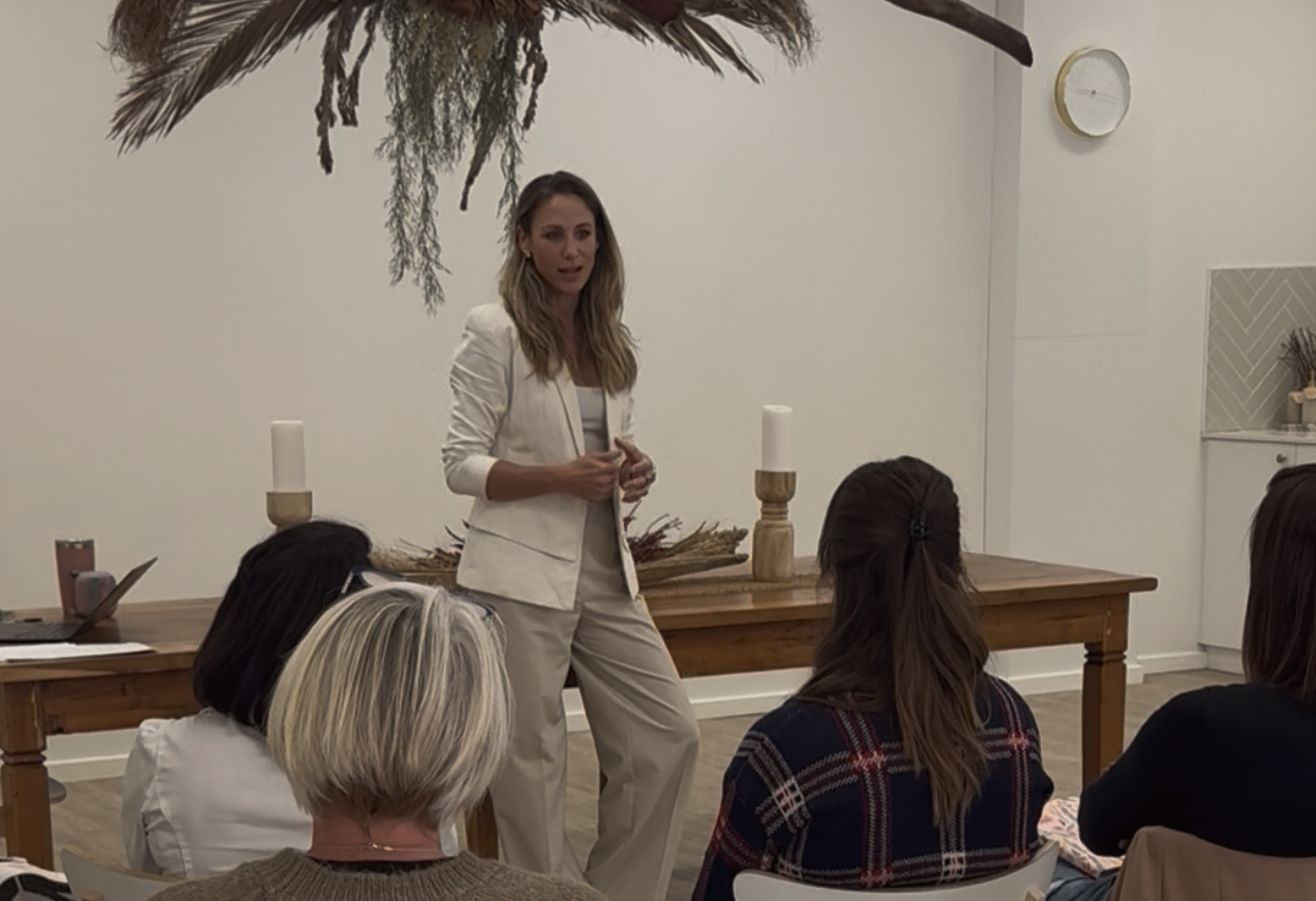 Rayne Bryant teaching a room of women