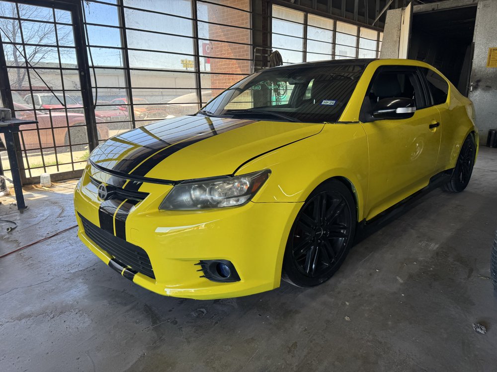 Dent repair in progress at I-35 Auto Painting & Collision Center, Lancaster, TX