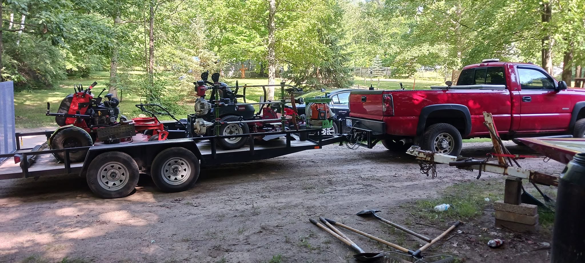 Lakehouse Lawn Care professional team and equipment Six Lakes Michigan