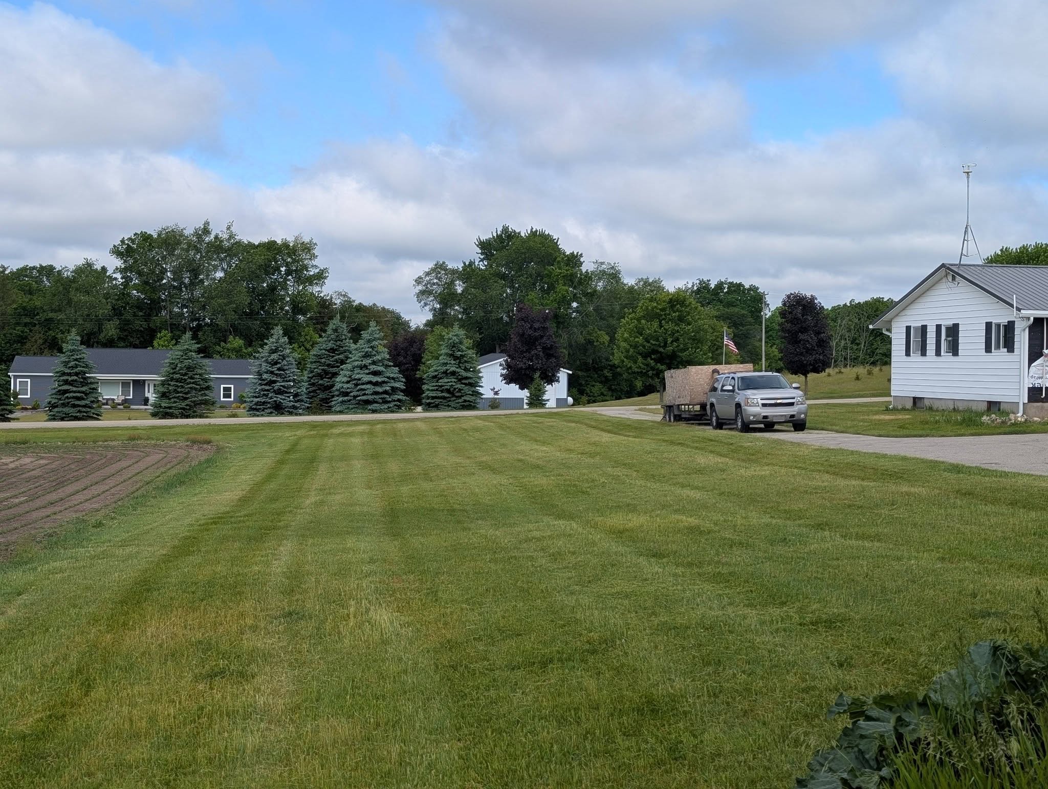 Property lawn care Six Lakes Michigan