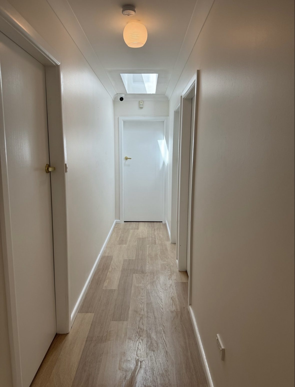 Hallway skylight bringing natural light into a corridor