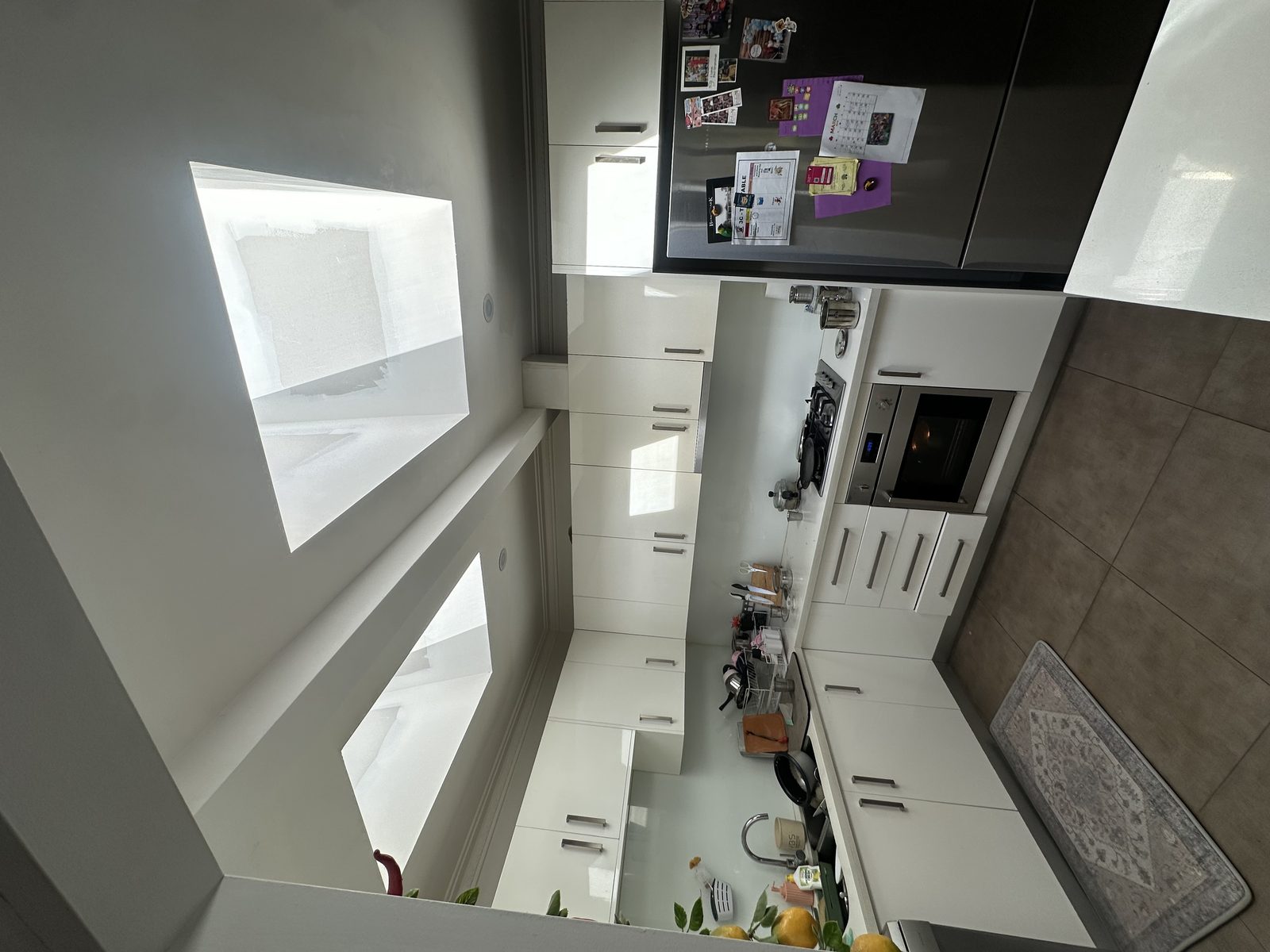 Kitchen with dual skylights, finished cabinetry