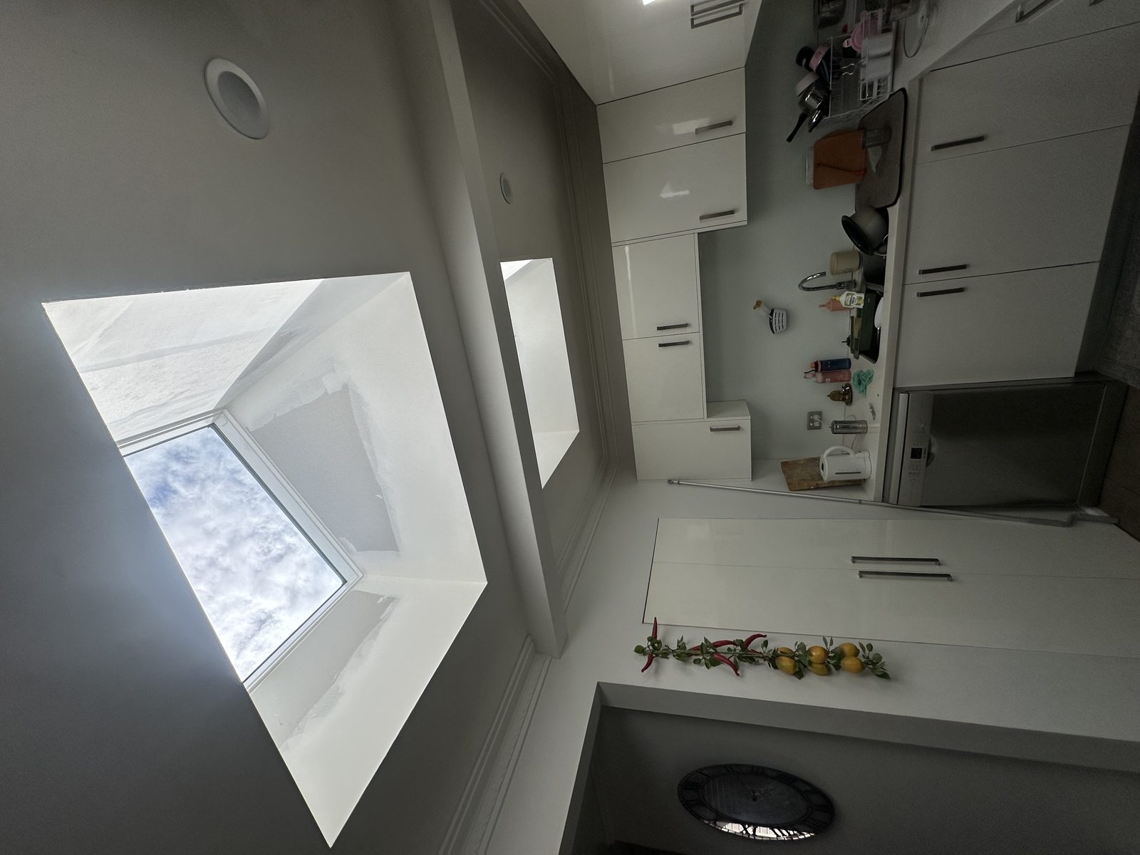 Kitchen skylight installation, finished and lined