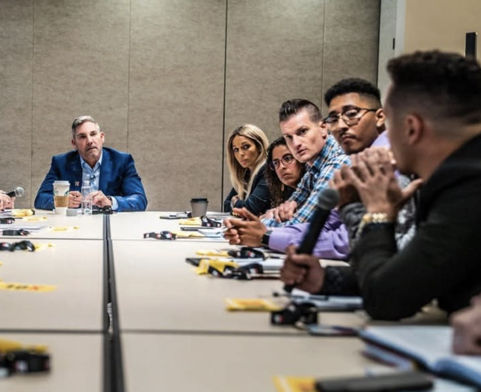 Gil Colon in a coaching session with Grant Cardone and other business coaches
