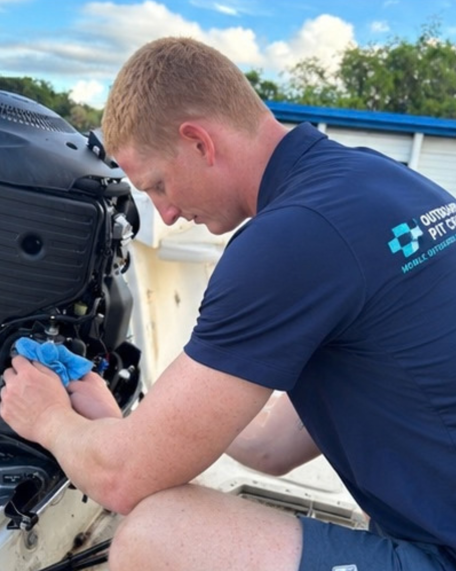 Outboard Pit Crew technician performing mobile outboard maintenance