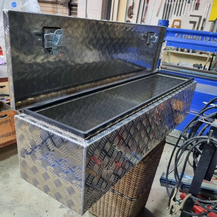 Sheetmetal fabrication including cutting folding and assembly